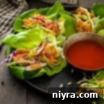 Crisp Buffalo Chicken Lettuce Wraps 17 Close up of Buffalo Chicken Lettuce Wraps