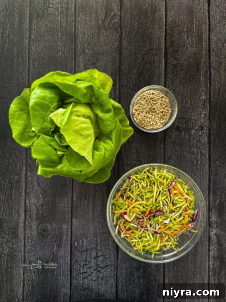 Crisp Buffalo Chicken Lettuce Wraps 6 Fresh butter lettuce, broccoli slaw, and sunflower seeds for serving Buffalo Chicken Lettuce Wraps