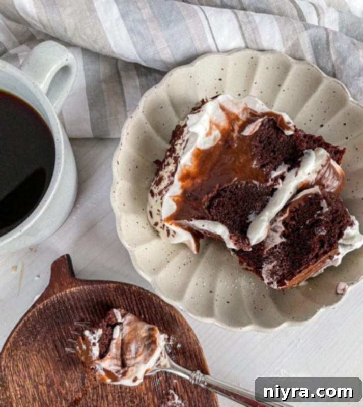 Poking holes in a warm chocolate cake for pudding absorption