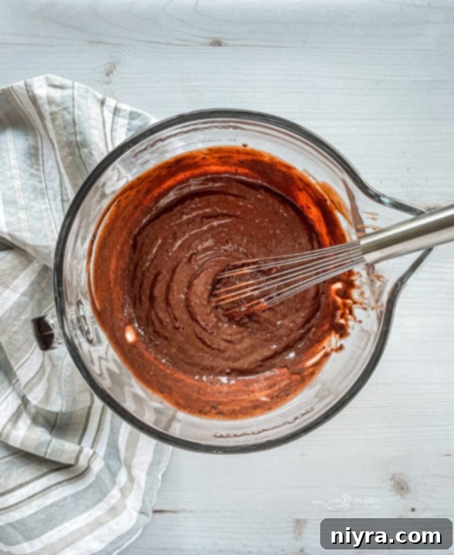 Preparing chocolate pudding while the cake bakes