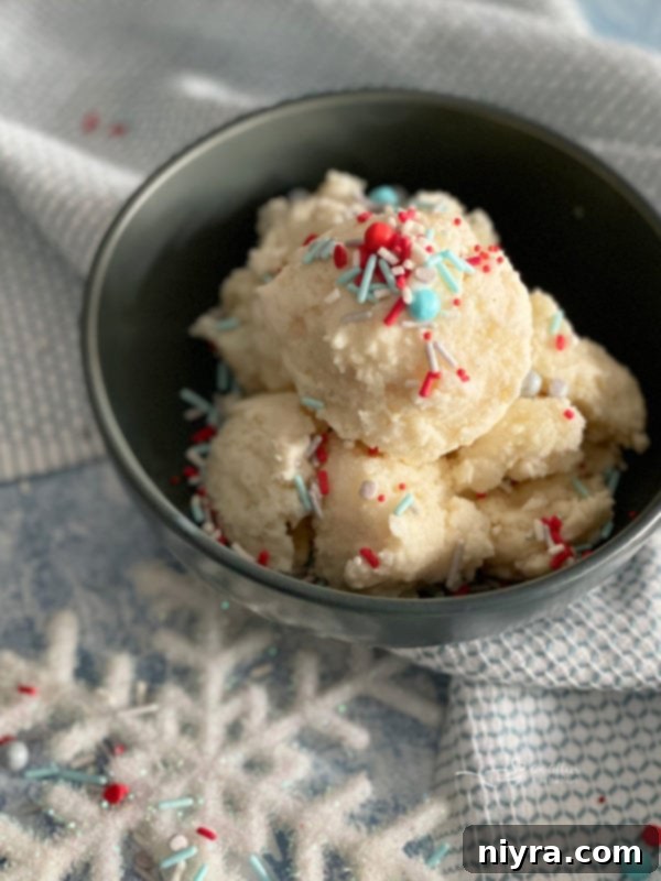 Creamy snow ice cream in a blue bowl with sprinkles