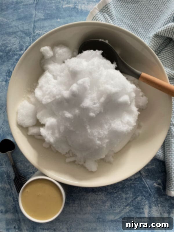 Scooped snow ice cream in a small bowl