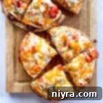 Recreate Taco Bell Mexican Pizza at Home 15 Taco Bell Mexican Pizzas cut on wooden board