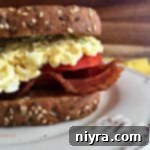 close up of BEST {Bacon, Egg Salad & Tomato} Sandwich