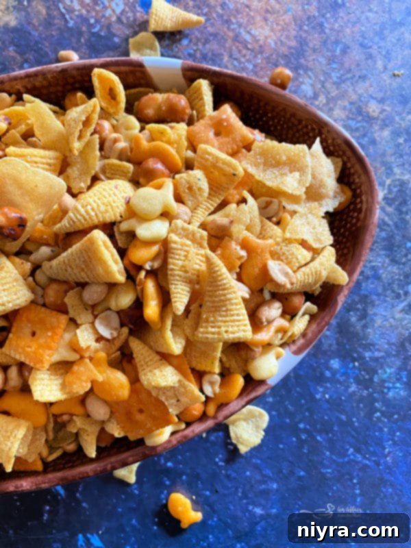 Touchdown Snack Mix Video 6 A vibrant assortment of crackers, chips, and nuts, showcasing the diverse ingredients of the snack mix.
