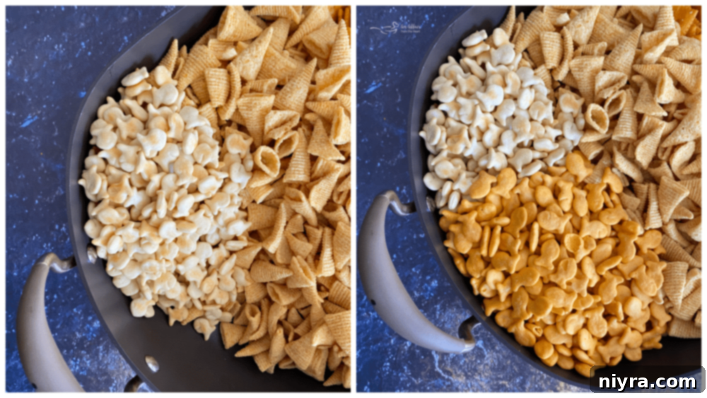 Touchdown Snack Mix Video 8 Various snack ingredients like crackers, pretzels, and nuts are poured into a large pan.