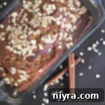 Overhead of Banana Applesauce Oatmeal Bread in a loaf pan