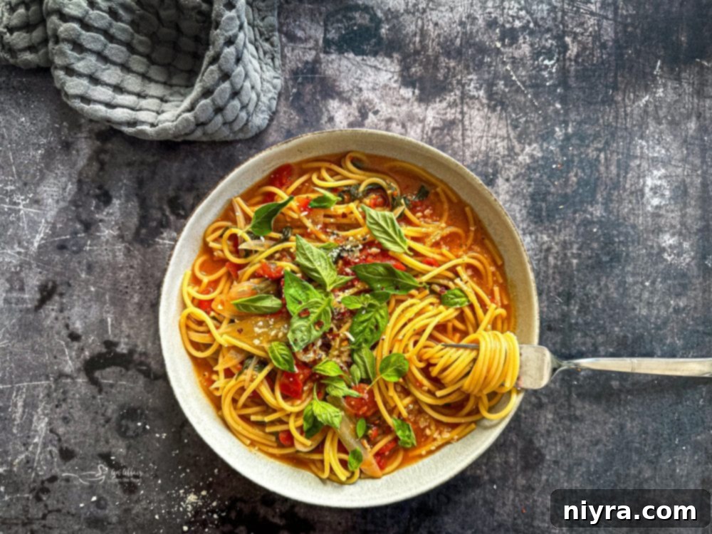 One-Pot Italian Magic 4 Italian Wonderpot Pasta simmering in a large purple stockpot