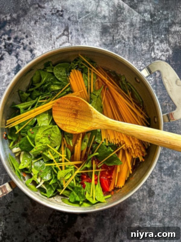 One-Pot Italian Magic 7 Stirring Italian Wonderpot Pasta in the pot during cooking