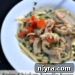 Pinterest image with text "Spicy Chicken Noodle Soup"