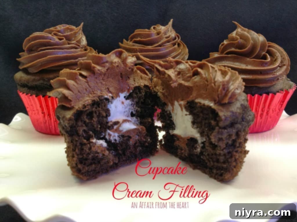 Two chocolate cupcakes with visible cream filling, one cut in half
