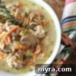 Chicken, Mushroom & Wild Rice Soup in a white bowl