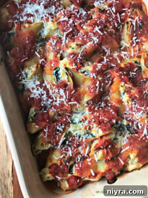 Baked Spinach & Artichoke Stuffed Shells, golden and bubbly from the oven