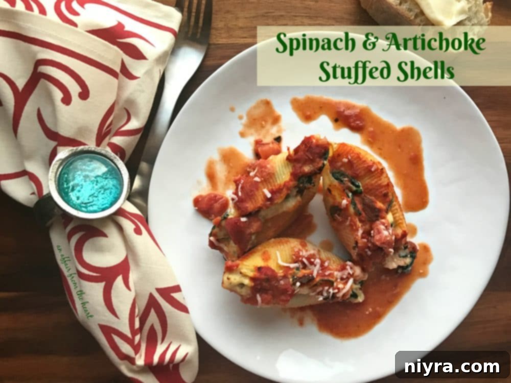 Final plated serving of Spinach & Artichoke Stuffed Shells, ready to eat