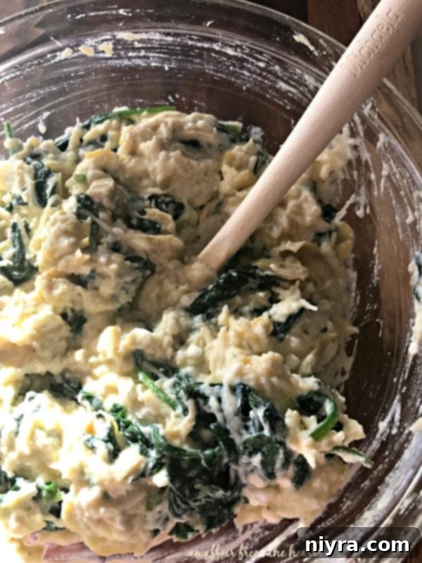 The rich and creamy spinach and artichoke filling for pasta shells