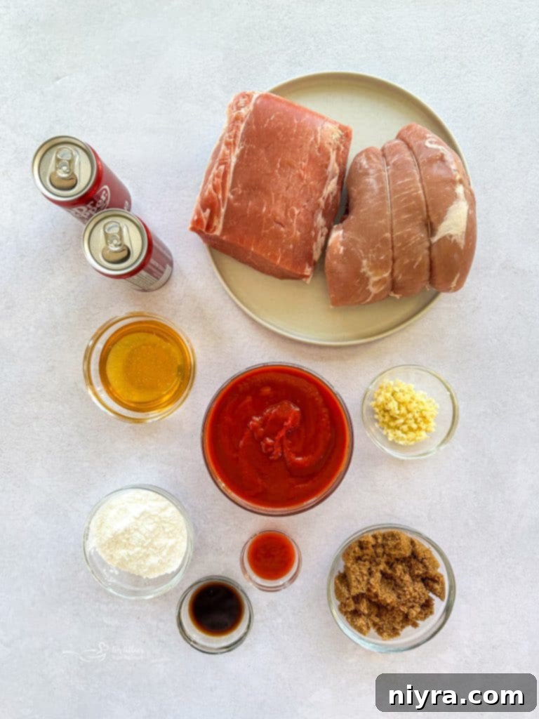 Slow cooker filled with Dr. Pepper BBQ pork, ready to be shredded.