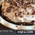 Close up of French silk pie in a white pie dish