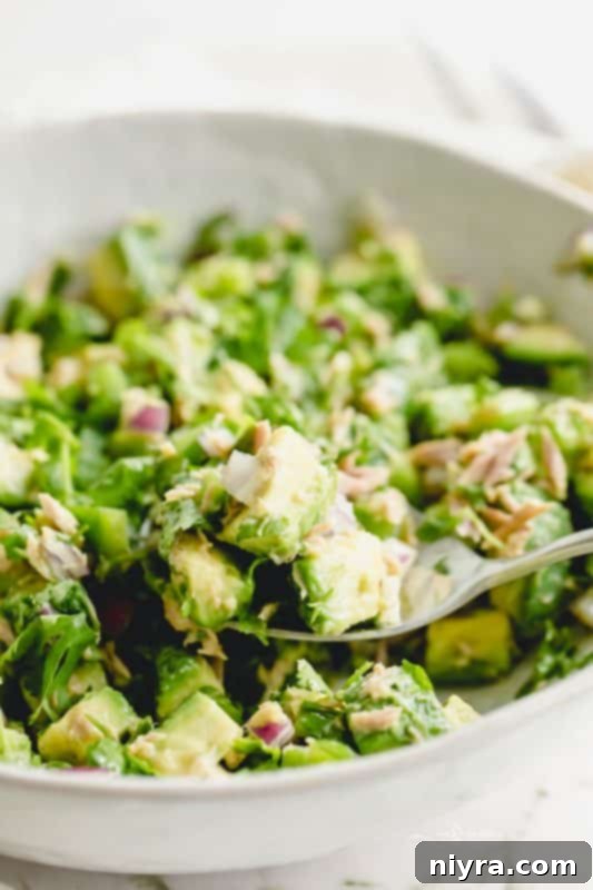 Avocado Tuna Salad served in a bowl, showing creamy texture and fresh ingredients.
