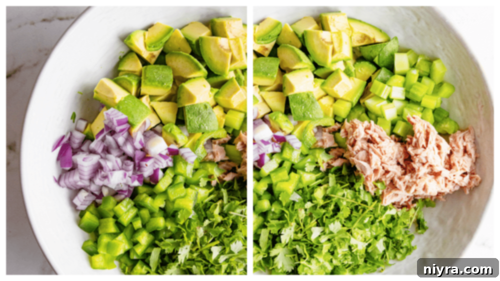 The dressing ingredients (olive oil, lemon juice, salt, pepper) being mixed in a bowl with a fork.