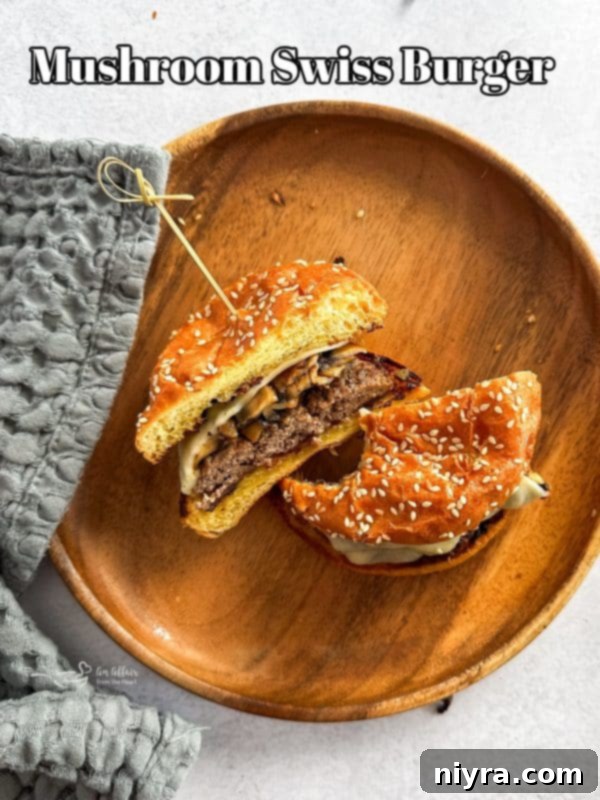 Hero shot of a delectable Mushroom Swiss Burger ready to be enjoyed.