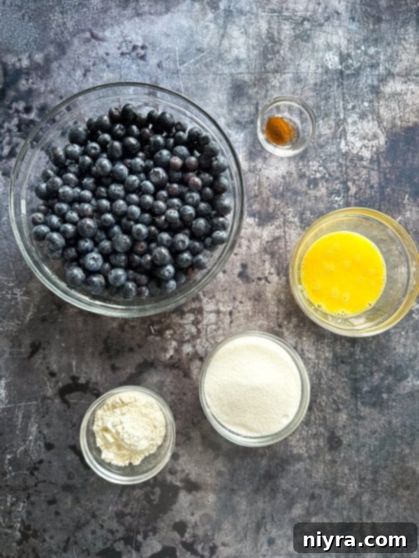 A whole baked blueberry pie showing its perfect crust