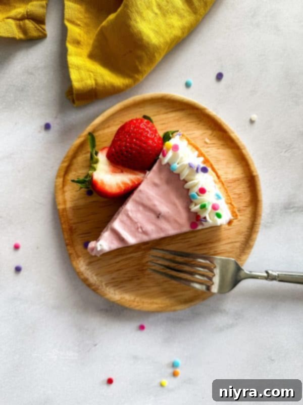 Close-up of the beautiful layers of an Ice Cream Cookie Cake: shortbread, chocolate, and ice cream