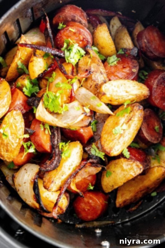Air Fryer Sausage and Potatoes, a delicious one-pan meal ready in 30 minutes.