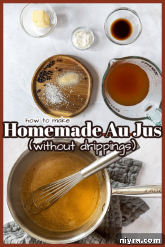 Homemade au jus in a small pitcher.