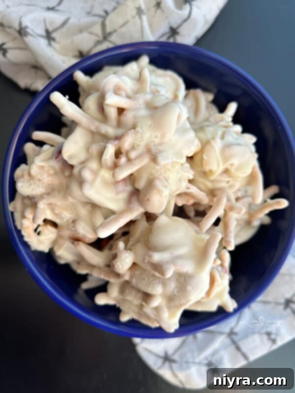 Ting-a-lings, a cluster candy, stacked in a blue bowl.