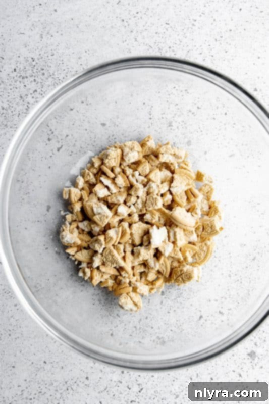 Step 3: Crushed golden Oreos in a large mixing bowl.