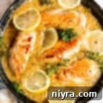 Lemon chicken in a cast iron skillet