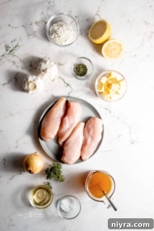 A whole lemon chicken served in a skillet, garnished with fresh thyme.