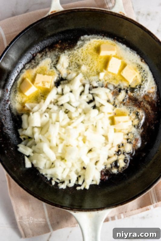 Cooked chicken breasts removed from skillet.