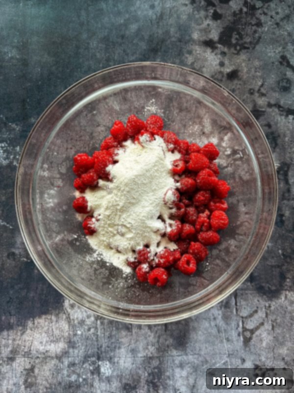 Mixing dry ingredients for raspberry pie filling