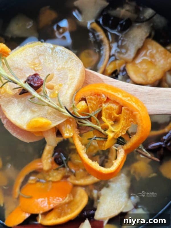 Pinterest-ready image for Autumn Simmer Pot recipe, showing a pot with fall ingredients.