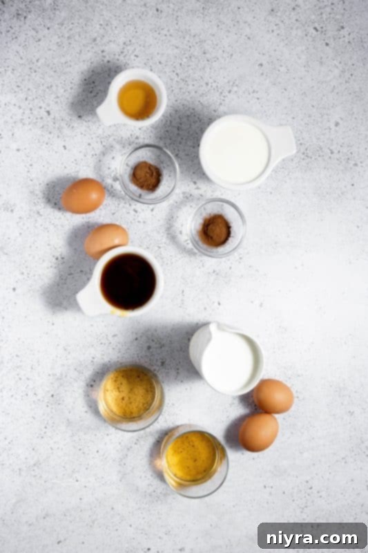 Homemade Blender Eggnog 6 Ingredients for homemade eggnog laid out on a kitchen counter, ready for blending.