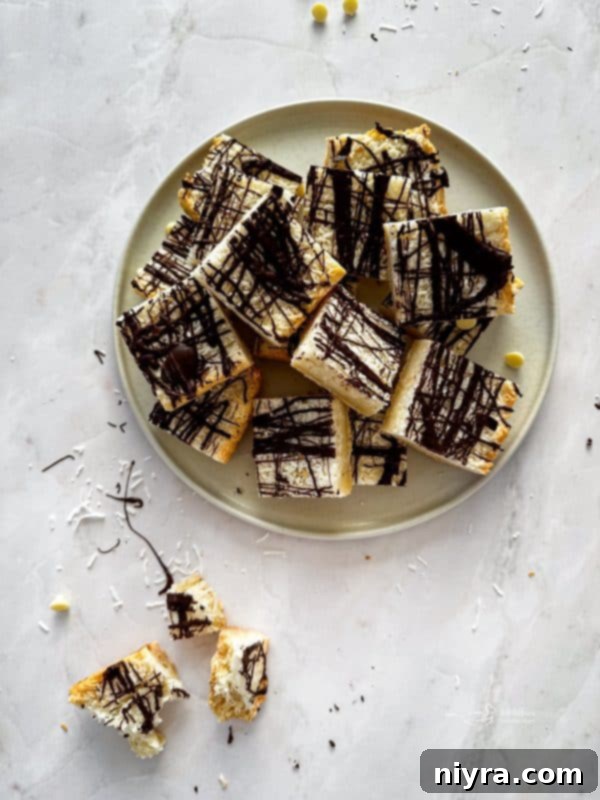 Chewy Coconut Macaroon Blondies 2 Freshly baked Coconut Macaroon Blondies on a cooling rack