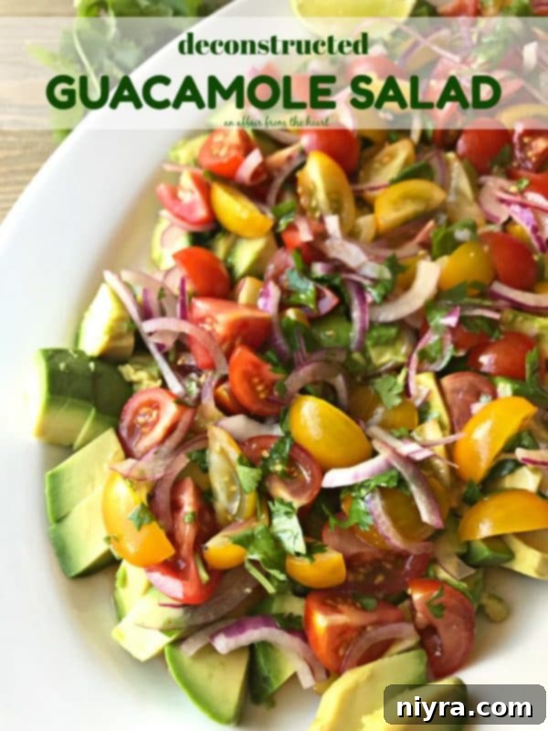 Layered Guacamole Salad 11 Deconstructed Guacamole Salad served as a side dish with grilled chicken