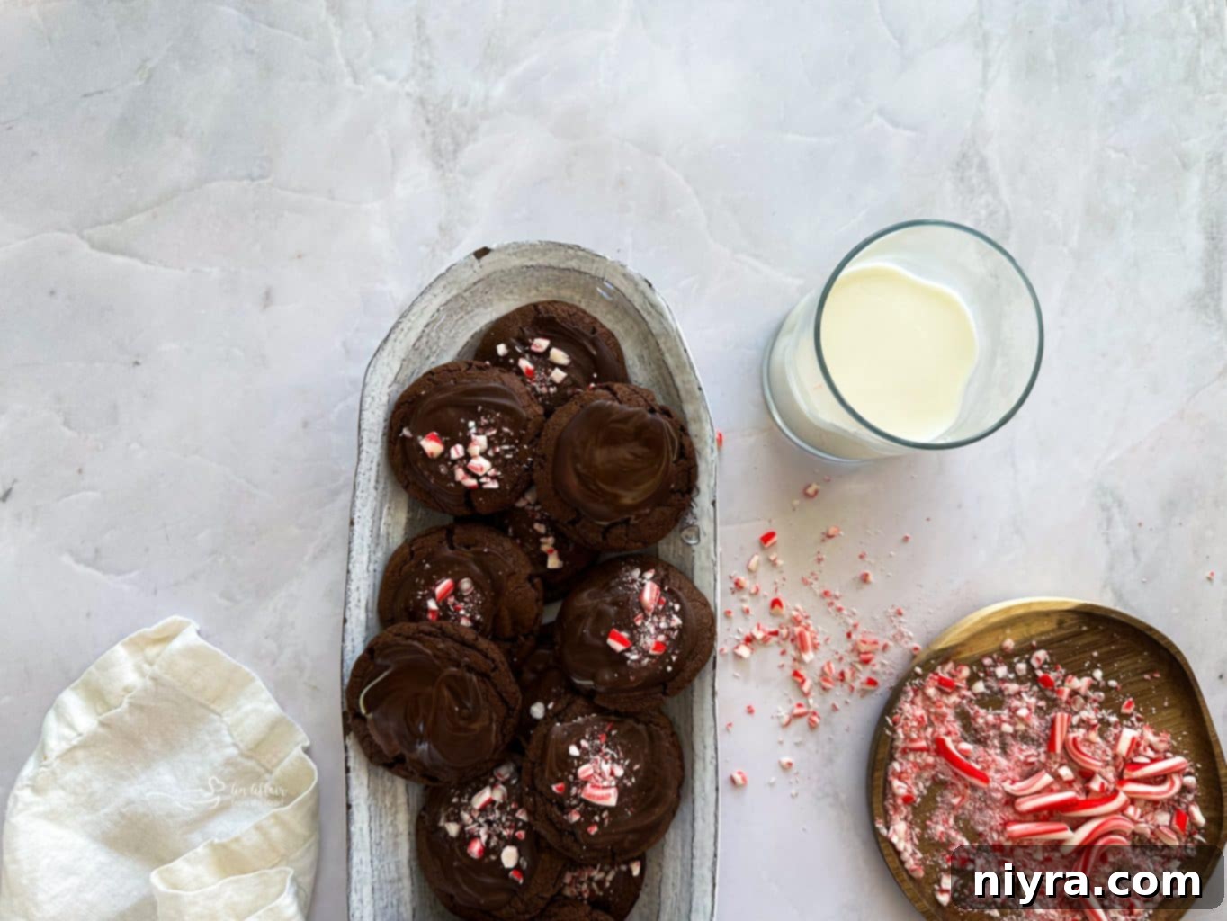 Various stages of making Chocolate Mint Candy Cookies.