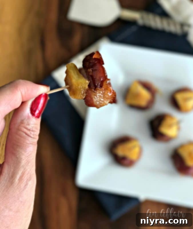 Aloha Bacon Wrapped Sausage Bites: A perfect blend of sweet and savory for any gathering.