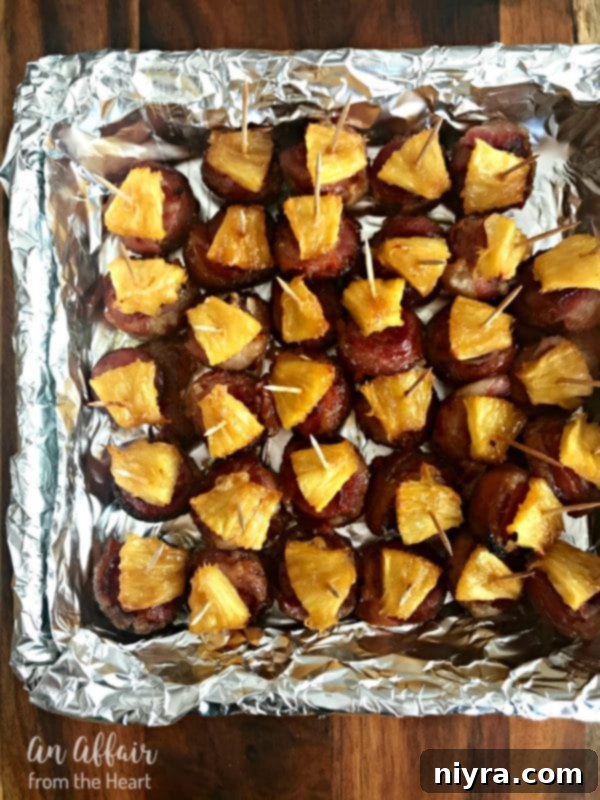 Aloha Bacon Wrapped Sausage Bites after baking, ready for a tailgate party.