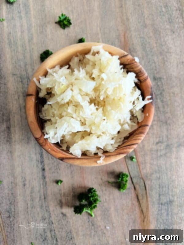 Reuben's Tangy Nacho Tower 16 A serving of Reuben Nachos with a fork