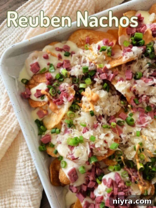 Reuben's Tangy Nacho Tower 19 Reuben Nachos hero shot, showing layers of ingredients