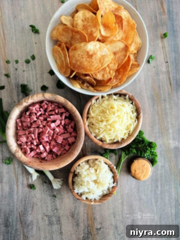 Reuben's Tangy Nacho Tower 4 Reuben Nachos on a baking sheet, ready to be served