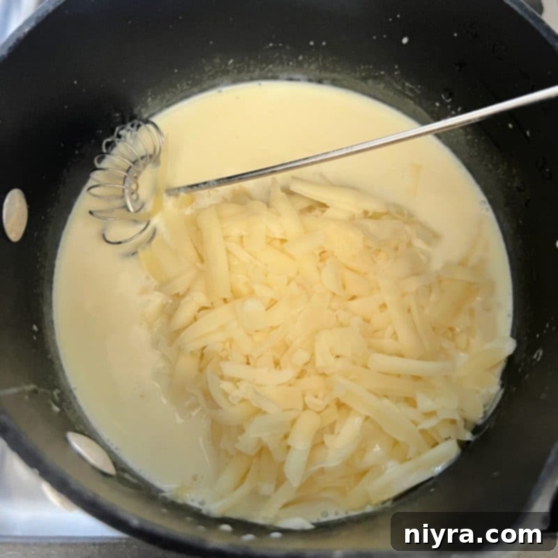 Reuben's Tangy Nacho Tower 7 Making the Swiss cheese sauce for Reuben Nachos