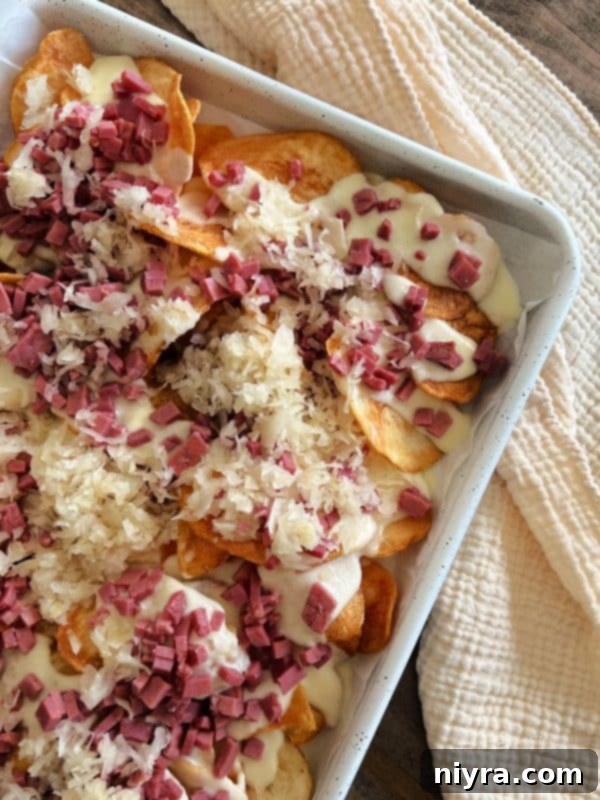 Reuben's Tangy Nacho Tower 10 Adding Frank's Kraut to Reuben Nachos