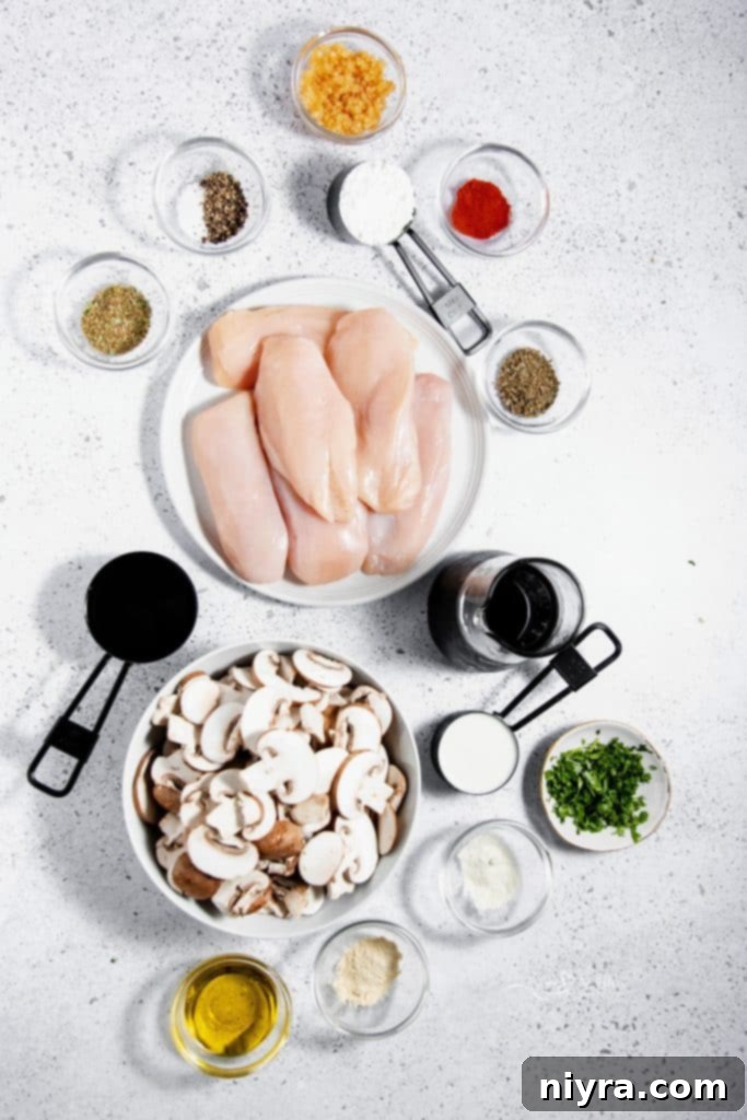 Easy Slow Cooker Chicken Marsala 5 A bowl of creamy Crock Pot Chicken Marsala garnished with fresh parsley.