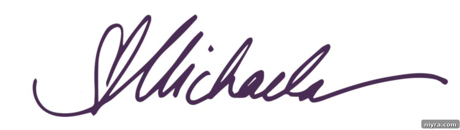 Michaela's handwritten signature, adding a personal touch to the article.
