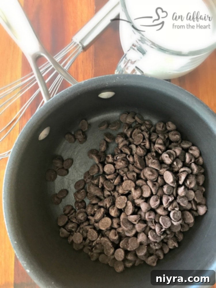 Perfect Chocolate Ganache Recipe 4 Chocolate chips and heavy cream melting in a saucepan