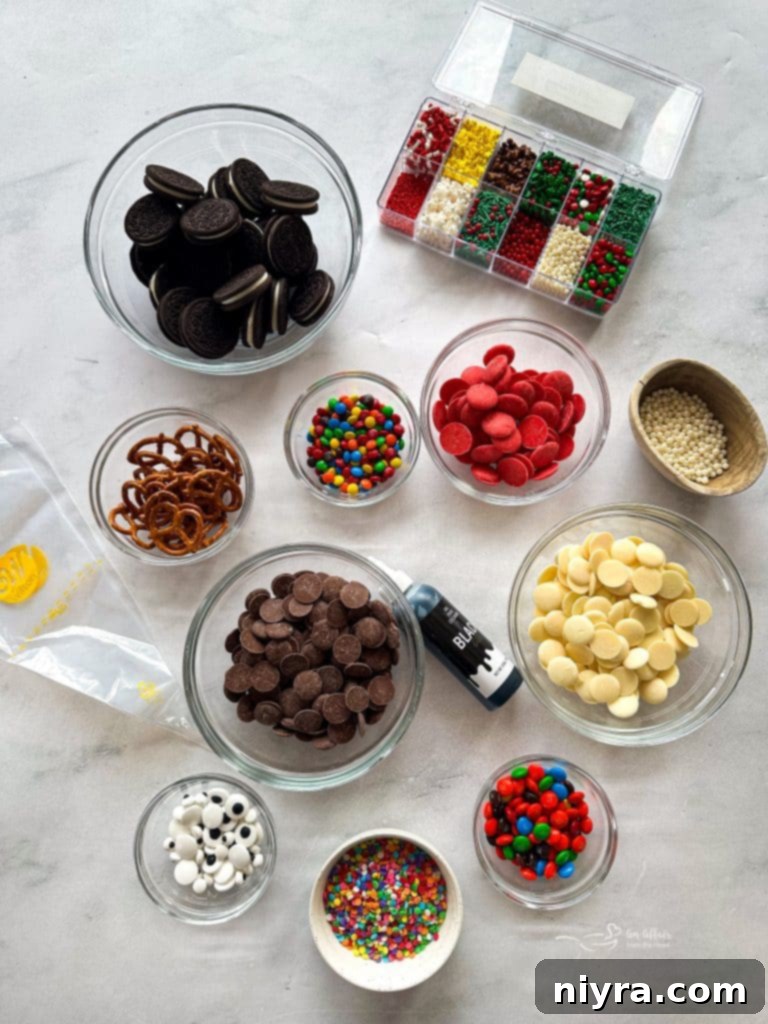 A festive plate filled with various Christmas-themed chocolate-dipped Oreos, decorated as Santa, reindeer, and polar bears, ready for a holiday celebration.